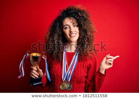 Foto d'archivio: Woman With A Trophy On Hands