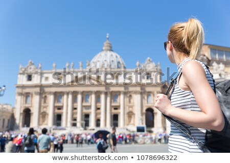 [[stock_photo]]: Woman In Front Of St Peters Basilica