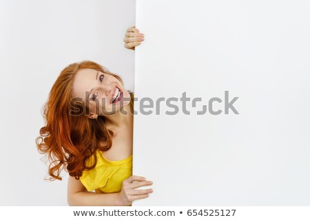 Stockfoto: Laughing Redhead Holding Blank Sign