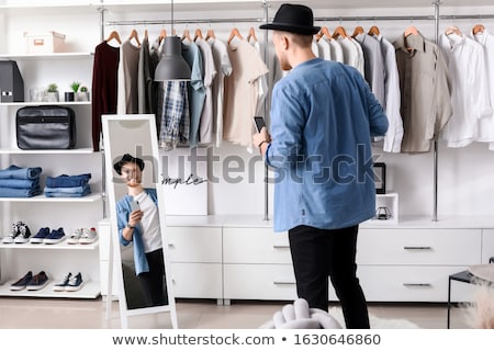 Stock fotó: Man Dressing Cloth At Home