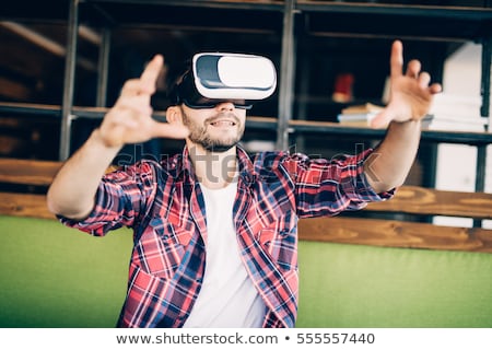 Stock foto: Playful Bearded Man Wearing Virtual Reality Device