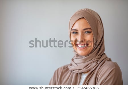 Foto stock: The Young Woman In Traditional Muslim Clothing