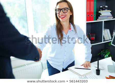 Zdjęcia stock: Modern Business Woman With Arm Extended To Handshake