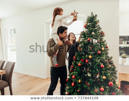 Stock fotó: Mother And Daughter Decorating Christmas Tree