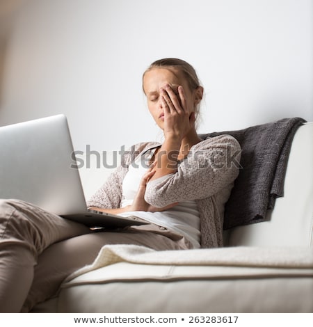 Stockfoto: Very Tired Young Woman Burning The Midnigh Oil