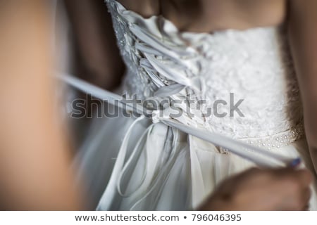 Stockfoto: Bridesmaid Preparing Bride For The Wedding Day Best Morning Wedding Concept