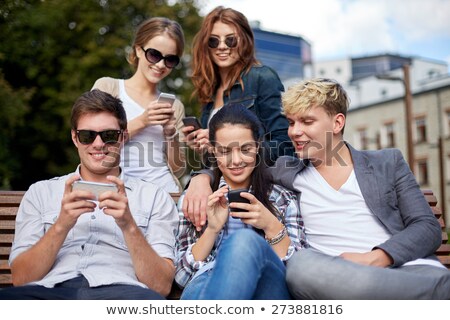 ストックフォト: Young Redhead Woman Sending Text Message With Phone Outdoor