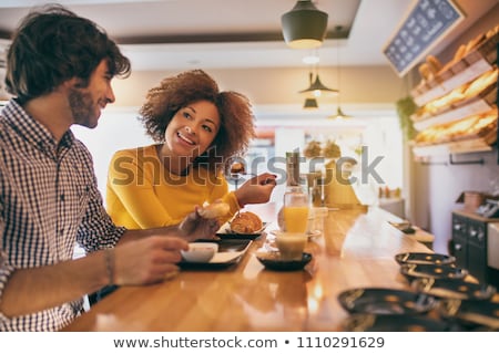 Сток-фото: A Young Couple Having Breakfast