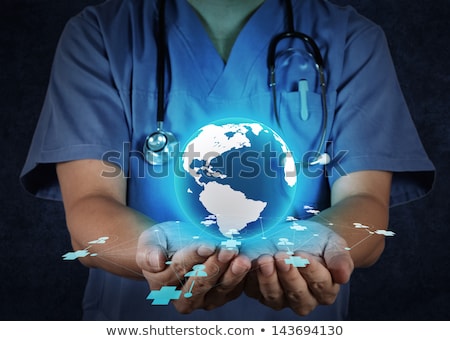 Сток-фото: Doctors Healing A Globe