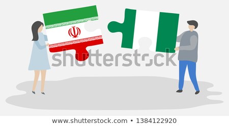 Foto stock: Iranian And Nigerian Flags In Puzzle