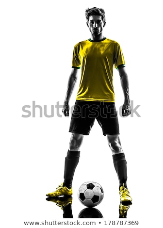 Stok fotoğraf: Young Soccer Player Poses Proudly