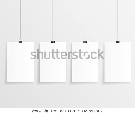 [[stock_photo]]: Four Clips On Wall