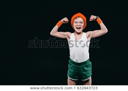 Foto d'archivio: Boy Posing In Sportswear Isolated On Black 12 Year Old Kids And Active Kids Concept