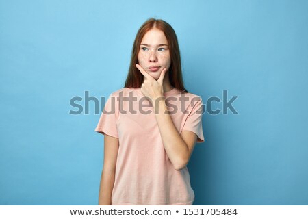 Stok fotoğraf: Close Up Image Of Pensive Ginger Woman Holding Chin