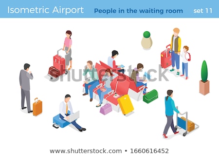 Foto stock: Businessman With Suitcase Walking In Waiting Room