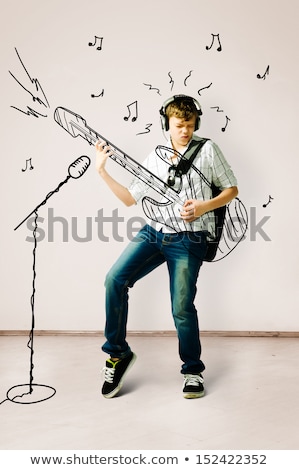 Stock fotó: Cute Teen Boy With Guitar