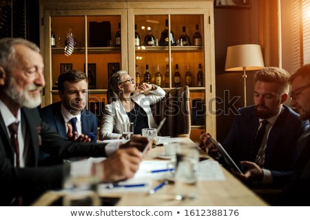 ストックフォト: Young Man Sitting On A Noble Chair