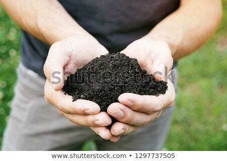 Сток-фото: Farmer Holding Pile Of Arable Soil Close Up