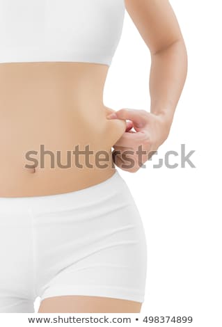 ストックフォト: Woman Pinches Fat On Her Belly Isolated On White Background