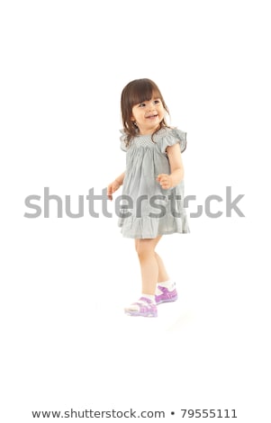 Foto stock: Cute Smiling Toddler Girl Looking Away Isolated On White