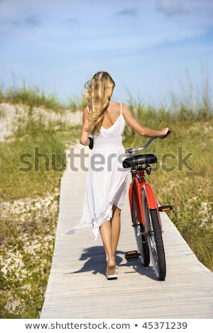 Young Woman On The Beach Vertical Shot Imagine de stoc © iofoto