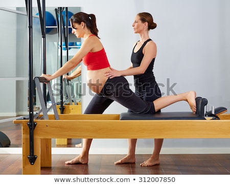 Foto stock: Pilates Aerobic Instructor Woman In Cadillac