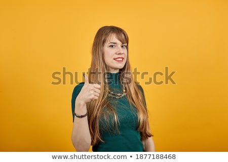 [[stock_photo]]: Image Of Attractive Blonde Woman Showing Thumbsup