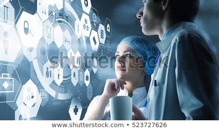 Stock photo: Female Medical Doctor Working With Healthcare Icons