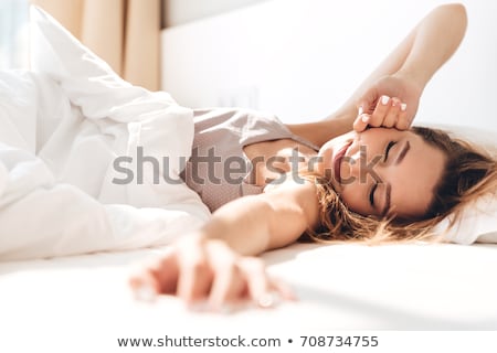 Foto stock: Woman In Bed