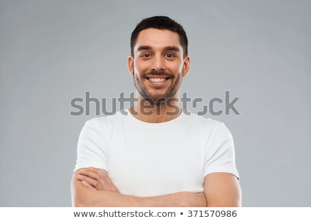 Foto stock: Portrait Of A Cheerful Young Man Background With Space For Text