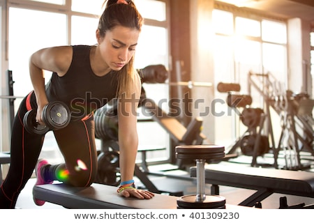 Сток-фото: Sportive Girl With Dumbbells