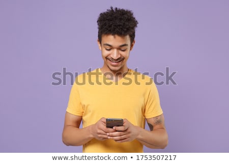 Stockfoto: Portrait Of A Smiling Young Afro American Man