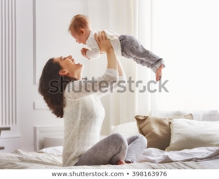 [[stock_photo]]: Happy Baby Child Play Fun In Bed