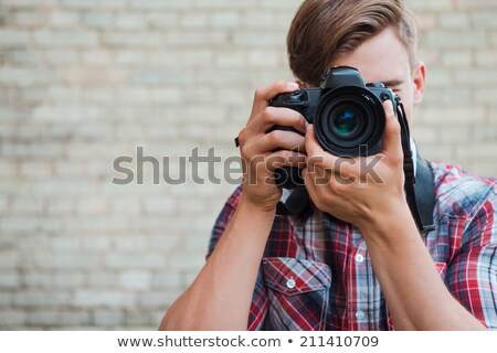 Zdjęcia stock: Young Man Photograph With His Digital Camera