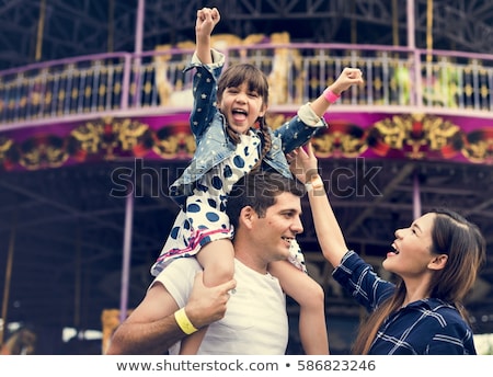Stock photo: Family In Amusement Park