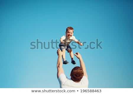 Stock fotó: Father With Baby On Sunset