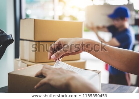 Foto stock: A Messenger Delivered By Courier Service Parcel Post