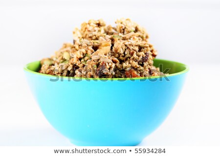 Foto stock: Healthy Breakfast Fresh Pumpkin Granola Muesli With Seeds Pecan Nuts Cranberries And Maple Syrup