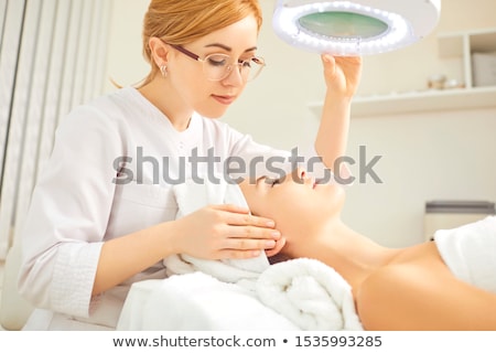 Stock foto: Examining Facial Skin