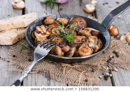 Foto stock: Roasted Mushrooms Champignons In Pan