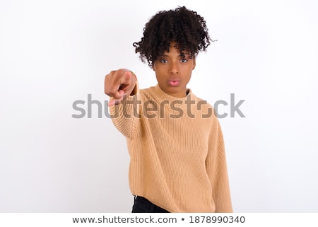 Foto stock: I Choose You And Order Positive African American Woman Points At You Makes Finger Gun Gesture Has