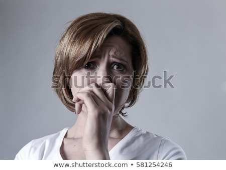 Zdjęcia stock: Confused Red Haired Girl Covering Mouth By Hands