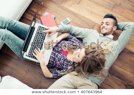 Foto stock: Young Couple In Clothes Shop