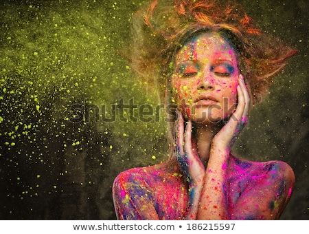 Foto stock: Young Woman Muse With Creative Body Art And Hairdo