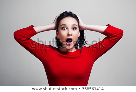 Stock fotó: Young Woman Reacting In Shock And Amazement