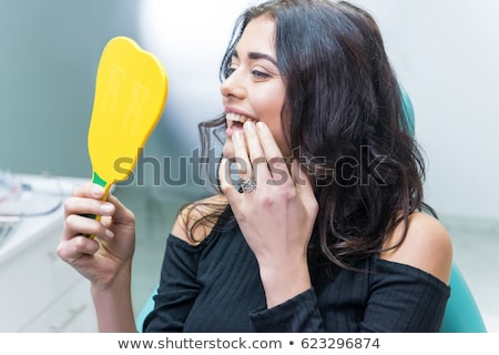 Stockfoto: Female Doctor Working On New Teeth Implant