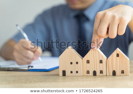 Stock fotó: Businessman Picking House Model