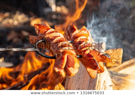 Stock foto: Preparing Food On Campfire