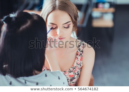 Stock photo: Makeup Artist Applying Eyeshadow