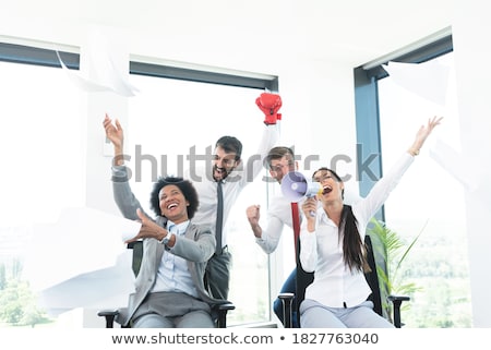 Stockfoto: Ecstatic Businesswoman With Boxing Gloves